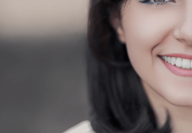 Woman with dental implants in London