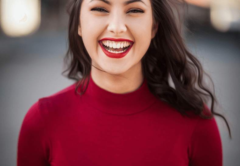 Woman with cosmetic dentistry treatment in London