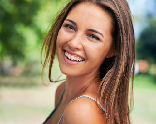 woman with dermaroller microneedling in Clapham, London