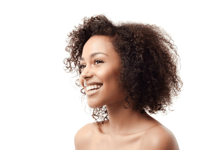 Woman smiling looking left away from the camera