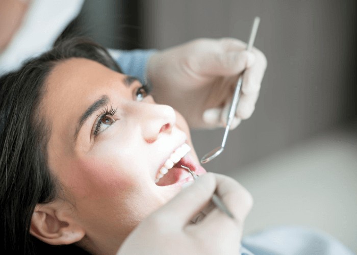 A woman having an Emergency Dentist appointment in London