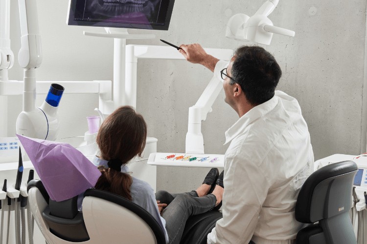 A woman receiving an emergency dentist appointment in London
