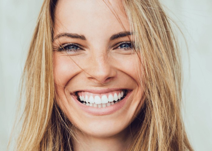 Crescent Lodge Dental Practice in Clapham Common, London - woman with adult braces