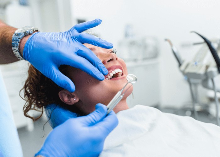 Woman receiving an emergency appointment at Crescent Lodge Dental Practice, London
