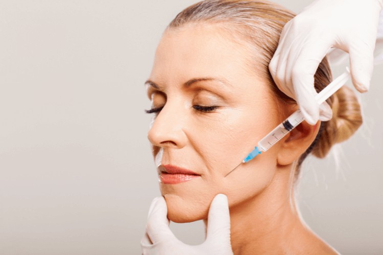 woman receiving anti-wrinkle treatment in her cheeks. she wanted the question "how long does botox last" answered.