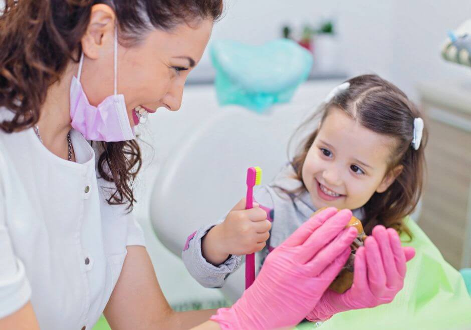 dentist and child at myofunctional braces appointment at Clapham dental practice
